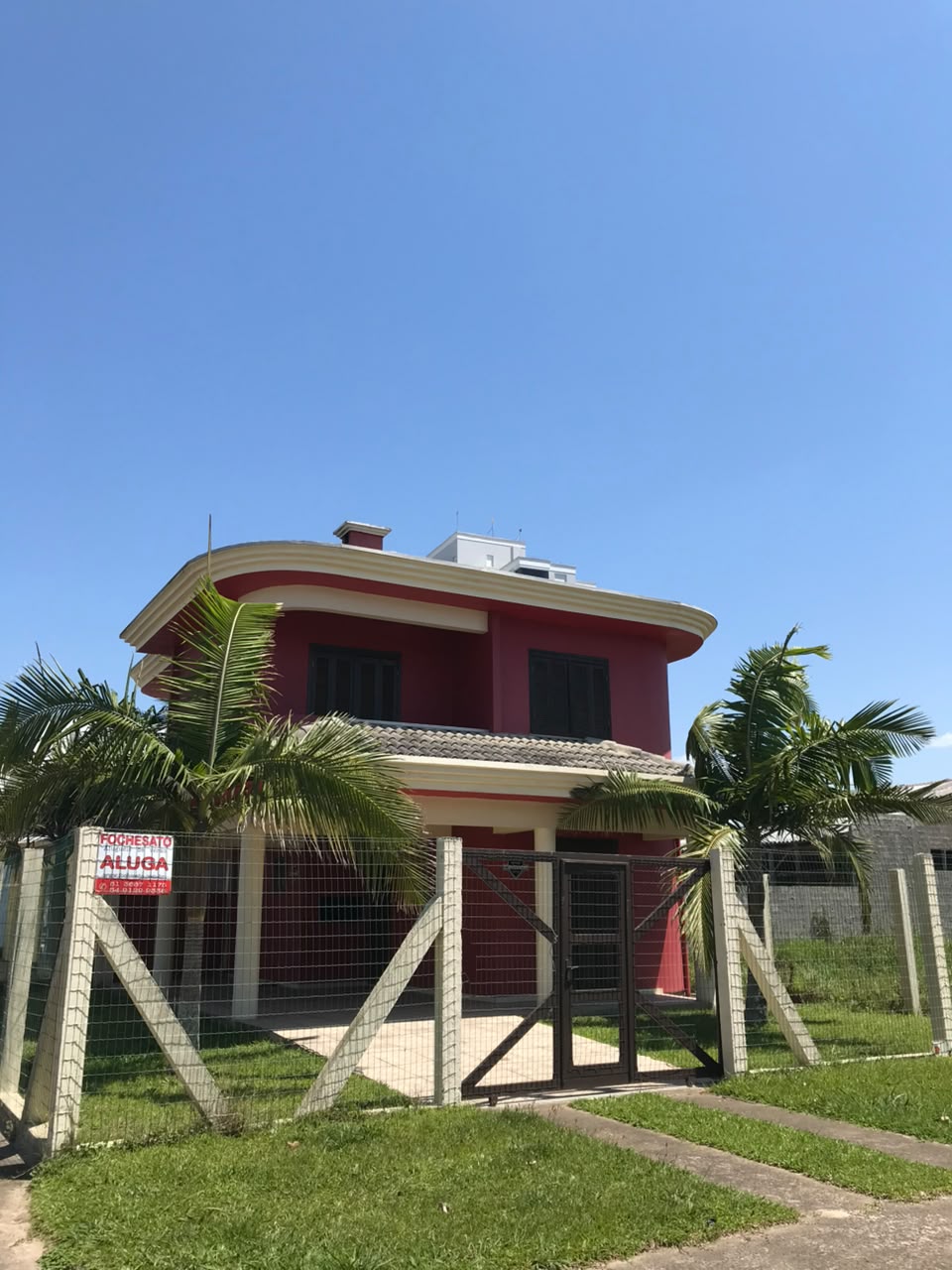 Fachada da Casa Vermelha para aluguel de verão em Arroio do Sal